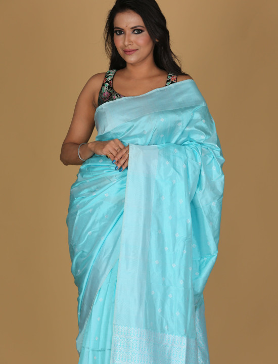 Mousumi Design Peacock Saree – Light Blue with White Patterns and Peacock Blue Border
