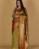 Chandramala Design Bottle Green Saree – Red Base with Green Border Chandramala Design Bottle Green Saree – Red Base with Green Border